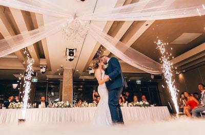 bride and groom kissing kissing on the dance floor